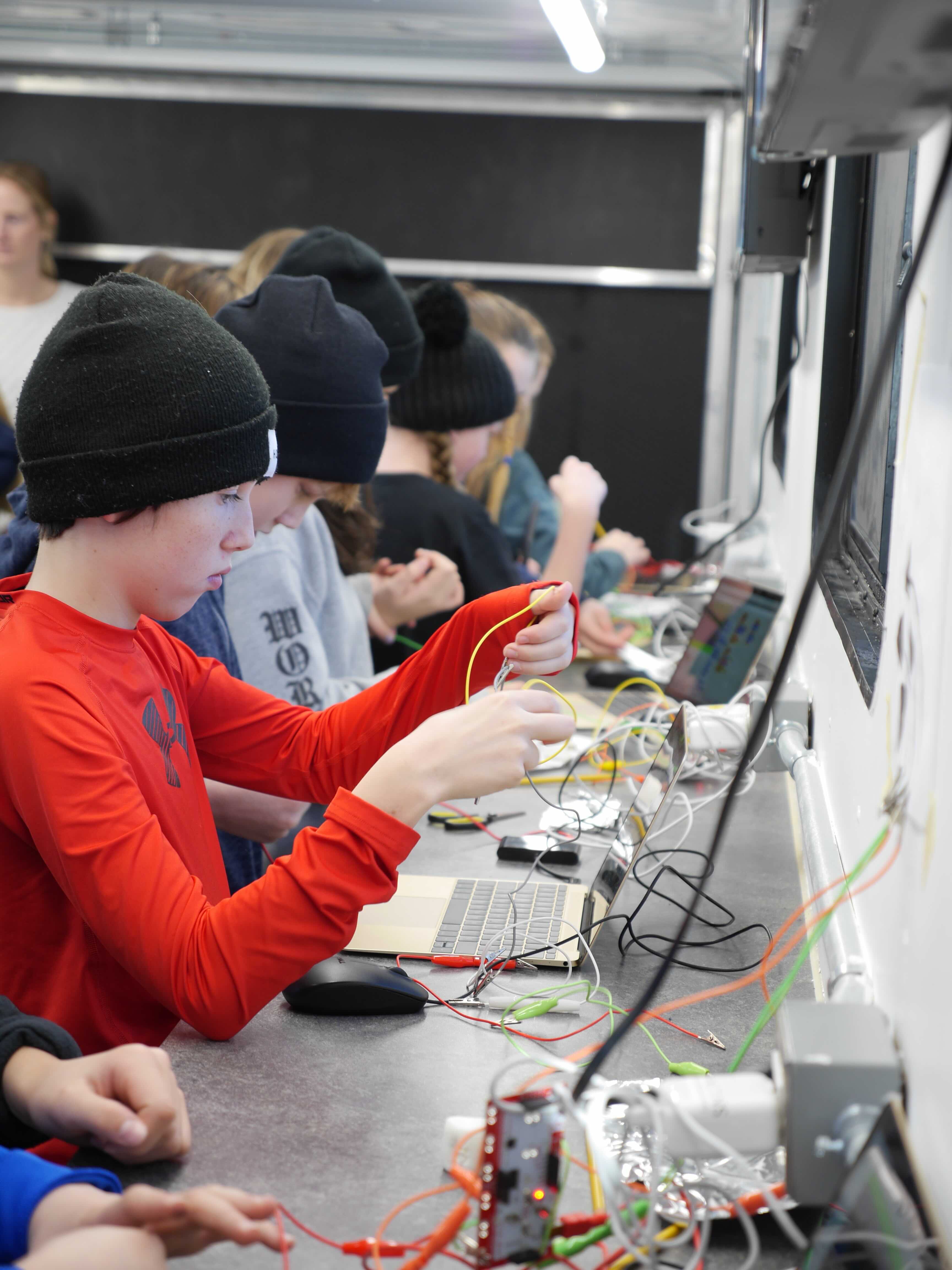 Students working with wires