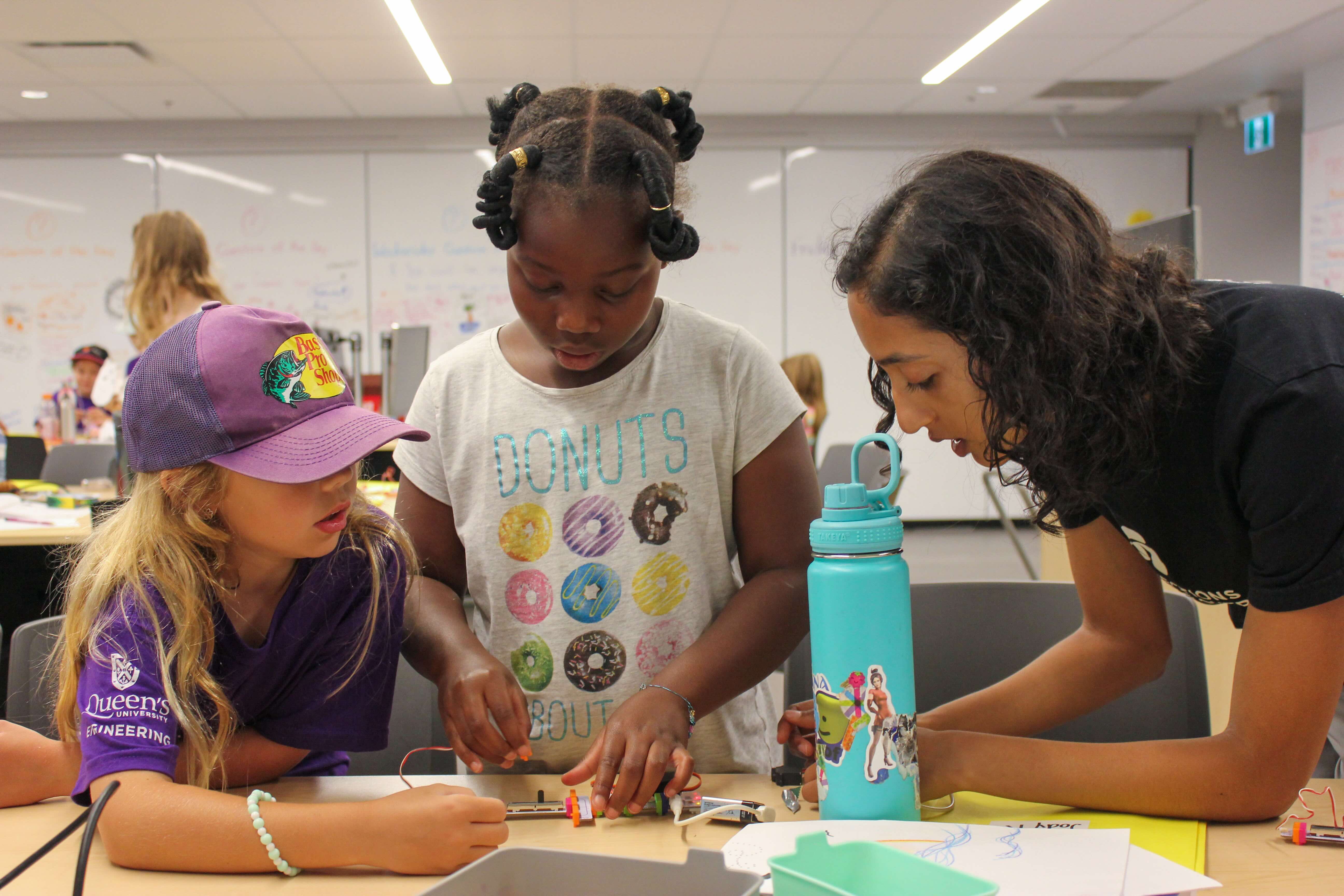 Female students working with littlebits technology